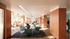 Vibrant and modern communal lounge with cozy seating and natural light, perfect for relaxation and social gatherings.