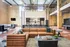 Clubhouse view of the large leather sectional couch at Model Tobacco Lofts in Richmond.