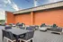 Seating for residents on rooftop terrace at Model Tobacco Lofts.