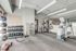 Modern fitness center with state-of-the-art equipment, sleek design, and ample space for workouts.