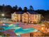 Cayce Cove resort-style pool at dusk