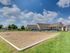 Sand Volleyball Court at The Landings at Chandler Crossings | Student Housing Near Michigan State University