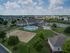 Birdseye view of pool, volleyball court, basketball court, clubhouse at The Landings at Chandler Crossings | East Lansing, MI Apartments Near MSU