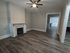 311 south 41st street house living room area with hardwood flooring and fireplace mantel