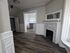 311 south 41st street ground floor hallway with fireplace mantel, closet, and hardwood flooring. philadelphia