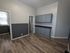 311 south 41st street kitchen area with cabinets and hardwood flooring