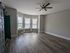 311 south 41st street bedroom are with hardwood flooring, built in closet, and ceiling fan.