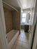311 south 41st street bathroom with tub/shower, sink vanity, and medicine cabinet.