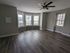 311 south 41st street living area with hardwood flooring and ample windows
