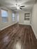 4036 locust street house bedroom with hardwood flooring and built in shelving unit. philadelphia university city.