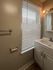 4036 locust street house bathroom with sink vanity and medicine cabinet