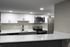 4029 walnut street unit 19 renovated philadelphia university city.  renovated kitchen with white granite countertops and stainless steel appliances; stove/oven, microwave and dishwasher.