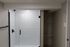 4029 walnut street unit 19 renovated philadelphia university city. bathroom with standing tiled shower and storage shelving