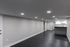 4029 walnut street unit 19 renovated philadelphia university city. living area with tiled flooring and view of kitchen.