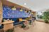 tenn student living knoxville studio lounge with booths and chairs
