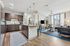 tenn student living knoxville model unit kitchen with island and stainless steel appliances