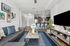 tenn student living knoxville model unit living room with couches and flat screen tv