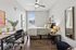 tenn student living knoxville mode unit bedroom with bed, storage drawers and desk.