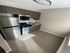 4417 spruce street philadelphia kitchen with stainless steel appliances; refrigerator, stove/oven, microwave
