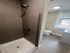 305 south 41st street philadelphia bathroom with toilet, sink, and stand up shower
