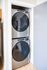 Modern stackable washer and dryer set in a sleek laundry nook, maximizing space with style.