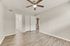 elegant wood flooring with a nice touch of paint and upgraded ceiling fan