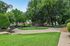 Charming outdoor space with lush greenery, cozy seating, and a serene atmosphere.