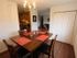 Long Pond Village Apartments, interior, dining room, four person table, wood floor, closet, kitchen and living room view