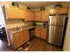 Long Pond Village Apartments, interior, kitchen, stainless steel refrigerator, dishwasher, tan cabinets, wood floor