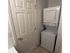 Long Pond Village Apartments, interior, laundry nook, stacked washer and dryer, doorway