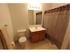 Long Pond Village Apartments, interior, bathroom, shower, sink, cabinets, mirror, toilet, tile floor, towel rack