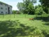 Long Pond Village Apartments, exterior, grassy fenced dog park, large trees and shade