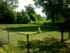 Long Pond Village Apartments, exterior, grassy fenced dog park, large trees and shade