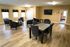 Long Pond Village Apartments, interior, spacious clubhouse, comfortable seating, dining for four, windows