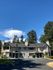 Picturesque suburban duplex with modern architecture and lush surroundings.