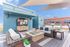 Rooftop social lounge with KC skyline views at RM West in Kansas City, Missouri.