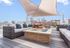 Rooftop firepit lounge at RM West in Kansas City, Missouri.