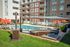 Resort-style saltwater pool with lounge chairs at RM West in Kansas City MO