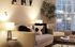 Stylish apartment living room with gray sofa and decorative accents at Centennial Ridge in Raleigh, NC