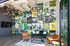 Community lounge with eclectic wall art and modern chandelier at The Flats at Chase in Eugene, OR