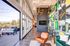 Vibrant lounge with chic furnishings and terrace access at The Flats at Chase in Eugene, OR
