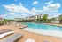 Resort-Style Pool with Sundeck at Stone Hill Apartment Community in Pflugerville, Texas