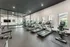 24-Hour Fitness Center Weight Training Area at Stone Hill Apartment Community in Pflugerville, Texas