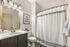 Guest bathroom in model apartment with modern fixtures at Chase Village Eugene OR