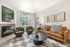 Bright and spacious living room in model apartment at Chase Village apartments in Eugene OR