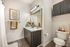 Primary bathroom in model apartment with modern finishes at Chase Village Eugene OR