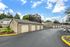 Residential apartment building exterior with landscaping at Chase Village Eugene OR