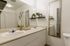 Modern bathroom with twin sinks and refreshing decor at Stadium Park in Eugene OR