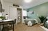 Furnished model bedroom with cozy earth tones at Stadium Park student apartments in Eugene OR