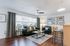 Bright furnished living room with modern furniture at Stadium Park student apartments in Eugene OR